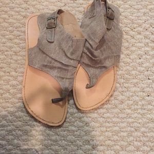 Tan sandals.